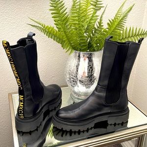 Steve Madden Arkin Mid Calf Chelsea Boots in black leather.